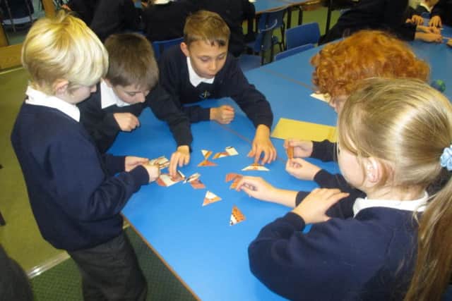 Pupils at West Butterwick Primary School identify Egyptian artefacts in school.