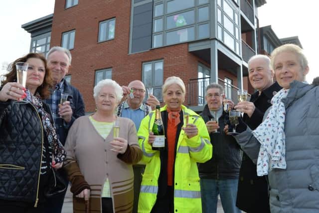 Pictured are new residents Linda and Laurence Pycroft, Pam and John Gibson, John Scully, and Jonathan and Jennifer Swatton with Jane Chubsey from Chestnut Homes