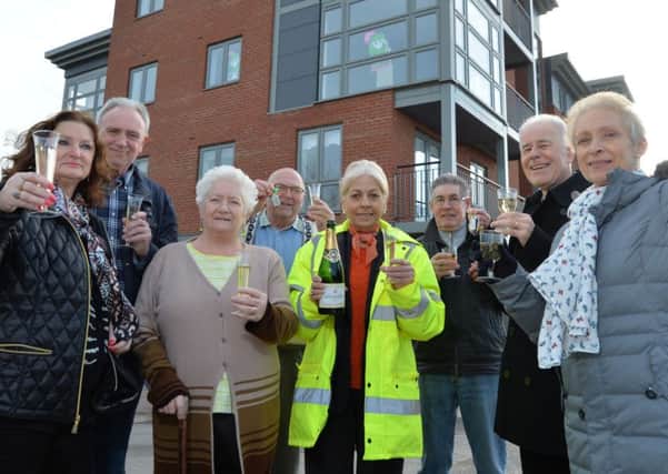 Pictured are new residents Linda and Laurence Pycroft, Pam and John Gibson, John Scully, and Jonathan and Jennifer Swatton with Jane Chubsey from Chestnut Homes
