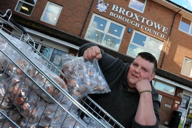 Russell Skellett delivers £1,850 in pennies to Broxtowe Borough Council offices to pay council tax on two properties that he owns.