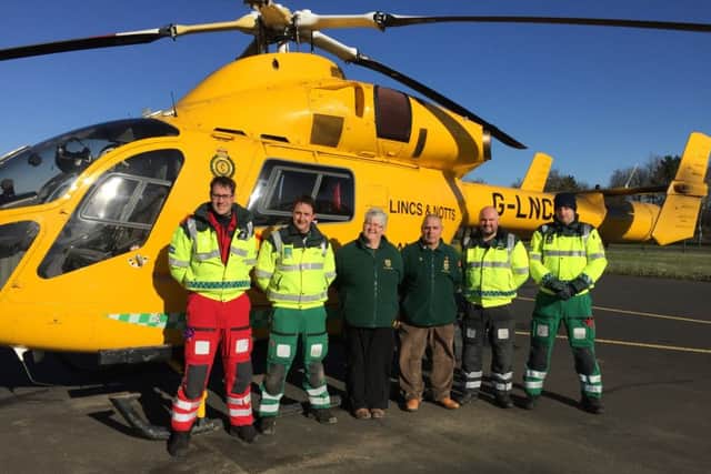 William and Fiona Elkington with the Air Ambulance crew