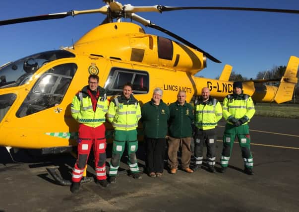 William and Fiona Elkington with the Air Ambulance crew