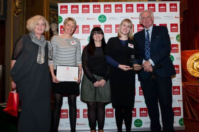 Staff at The Harley Gallery collecting their Hudson's Heritage Award
