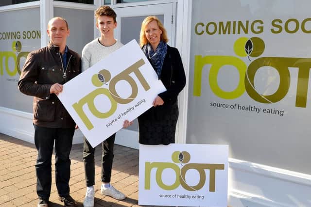 Michael and Mette with Jonathan and the new Root branding outside the Marshalls Yard store