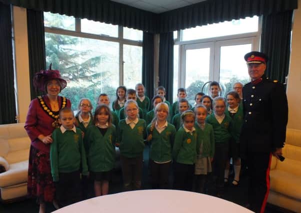 Haggonsfield pupils pictured with chairman of Nottinghamshire County Council, Councillor Sybil Fielding,  and the deputy Lord-Lieutenant of Nottinghamshire, Dr Nigel Chapman DL.