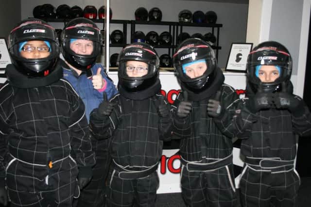 Pictured left to right are Arvind Sondh, teacher Mrs Emma Rodgers, Daniel Clarke, Riley Chambers and Ian Littlewood