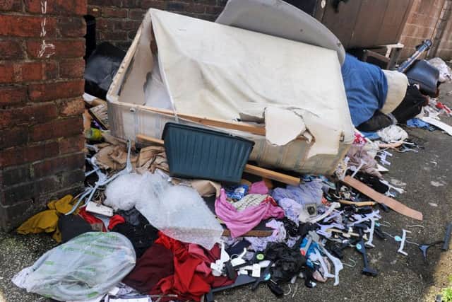 Fly-tipping mess to the rear of properties on Victoria Street, Mansfield, for which the Council want the residents to pay for clear-up.