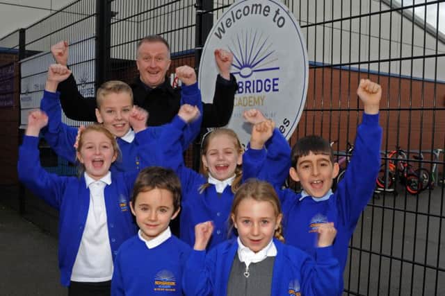 Headteacher George Huthart and pupils from Norbridge Academy, Worksop celebrate on achieving an outstanding Ofsted report. Picture: Andrew Roe