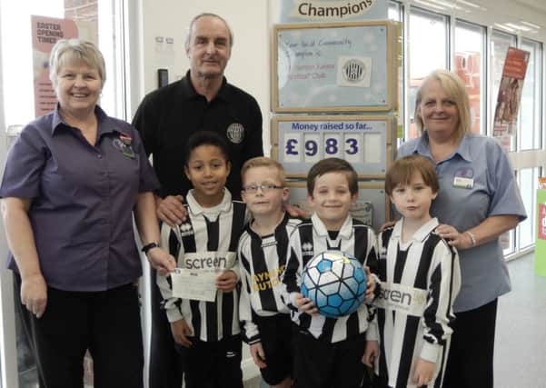 Misterton Juniors FC have been named the Co-op's latest community champions