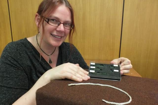 Emily Gillott has mocked up a metal copy of what the medieval one (green, boxed) would have looked like as a full whip.