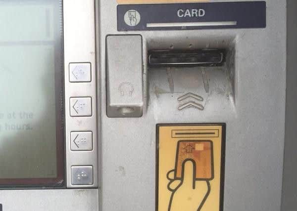A cash machine without a skimming device fitted.