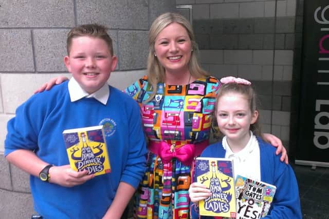 Children's author Pamela Butchart with Owston Park Primary pupils Jacob McLem, 11, and Calla Cox, 9.