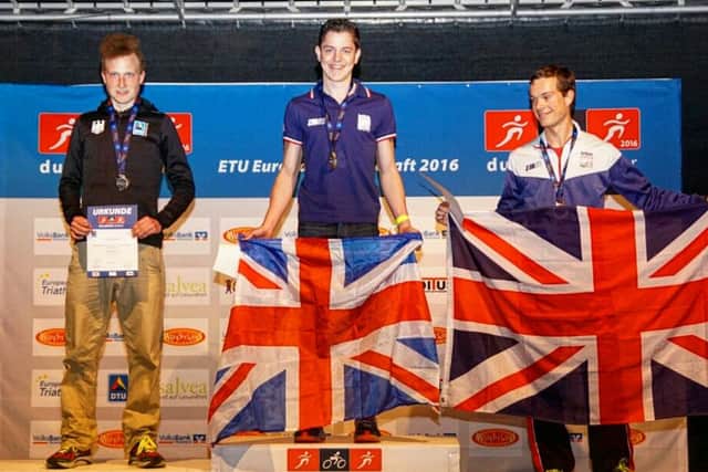Jordan Skelly (centre) on the podium.