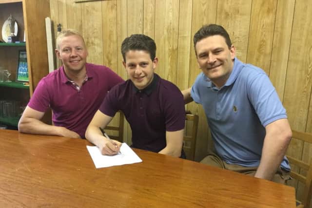New signing Marc Newsham (centre) is flanked by Glenn Kirkwood (left) and Craig Hopkins.