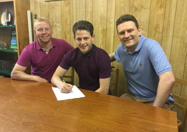 New signing Marc Newsham (centre) is flanked by Glenn Kirkwood (left) and Craig Hopkins.