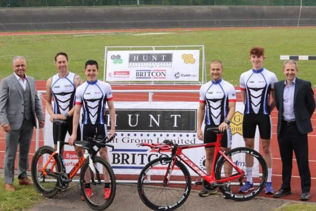 Shaun Hunt, Chief Executive of Britcon (left) and Paul Clarkson, Managing Director at Britcon (Right) with the Britcon Triathlon Racing Team