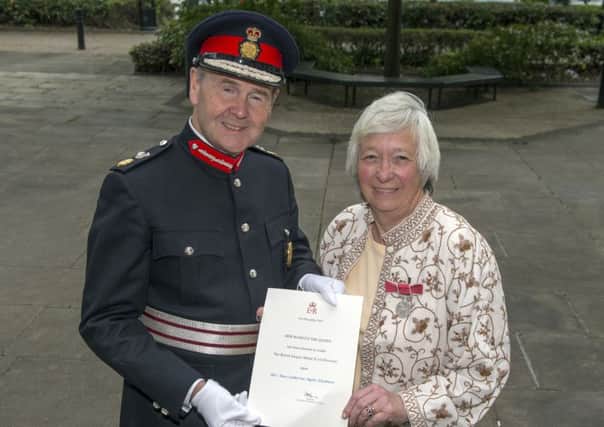 Ann Hickman receives the British Empire Medal from Sir John Peace, Lord-Lieutenant of Nottinghamshire at NottinghamÃ¢Â¬"s County Hall

Picture: Sarah Washbourn