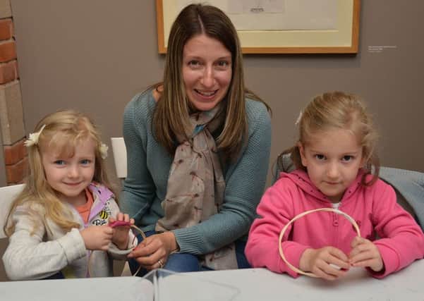 Hands On Holiday Workshops at Harley Gallery, pictured are Becky Cartlidge with daughters Isla, five and Amber, four
