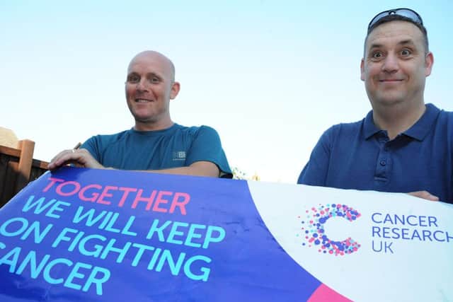 Gavin Forshaw, left and Steve Carroll who are walking from Worksop to Lincoln to raise money for Cancer Research UK.