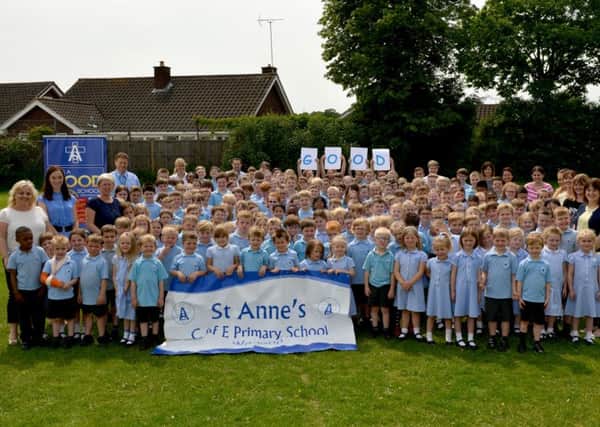 Children and staff at St AnneÃ¢Â¬"s Primary School celebrated their Good Ofsted report