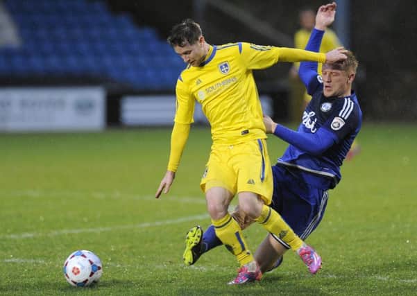 Gavin Rothery in action for Guiseley at Halifax Town last season. Photo by Bruce Rollinson.