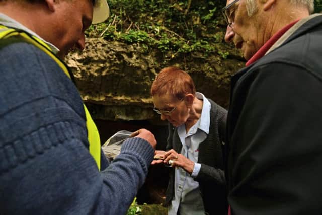 Archaeologists from Durham University on a dig at Anston Stones, pictured is Coun Christine Sadler examining some pottery found by the archaeologists
