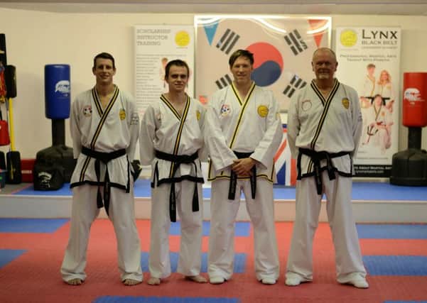 Pictured at the Lynx Academy grading are (from left) Robin Martin, Robert Macioszek, Master Andrew Blinston and Steven Sanderson
