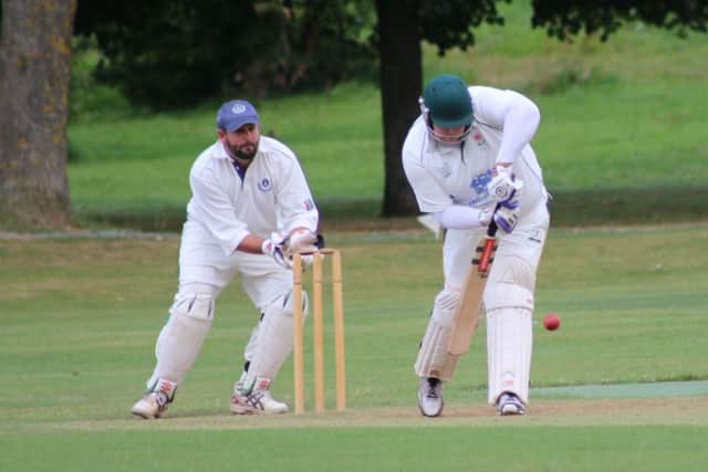 TOP SCORER -- batsman Richard Keightley on his way to a fine score of 70, which formed the backbone of Lea And Roses terrific total of 292.