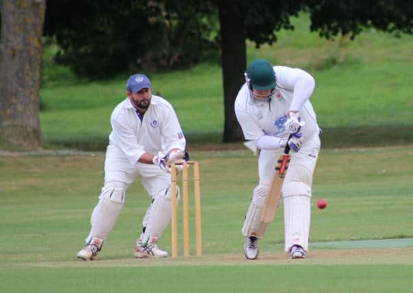 TOP SCORER -- batsman Richard Keightley on his way to a fine score of 70, which formed the backbone of Lea And Roses terrific total of 292.