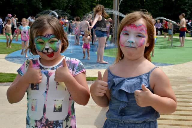 New splash pool and play area at Kings Park, Retford, pictured are from left Gosia Mazurliewicz, seven and Ruby Moore, seven