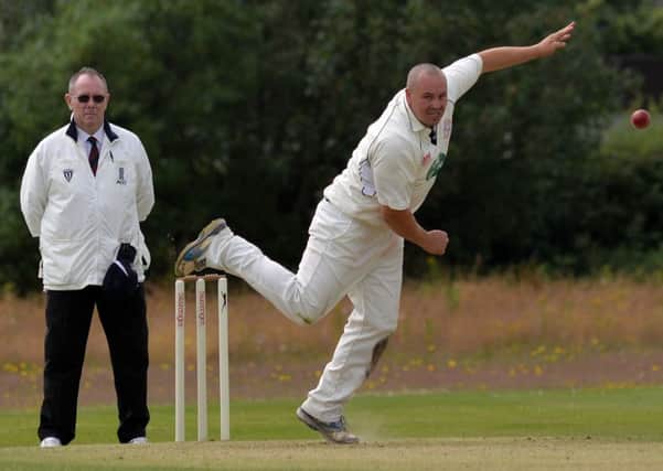 RHODES WORTHY -- fine bowling by Papplewick and Linby's Jim Rhodes had leaders Farnsfield on the rack until rain brought their top-of-the-table duel to a halt.