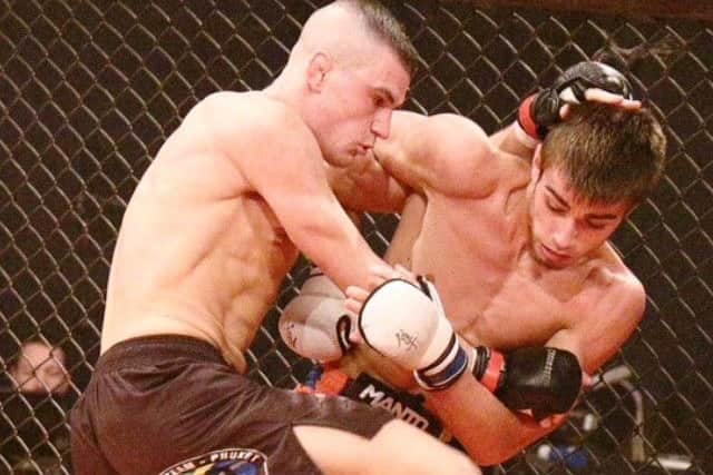 RARING TO GO -- mixed martial arts fighter Ricardo 'Rico' Franco (left), who is looking forward to his first professional fight.