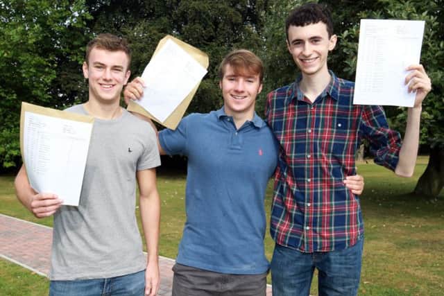A-level results day at Queen Elizabeth's High School in Gainsborough. Pictured are Harry Mann, Ben Skelton, and Ollie Powell. Photo: Chris Etchells