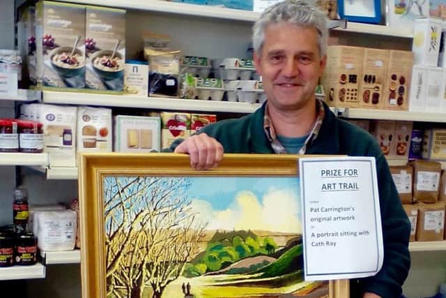 Dominic Schad with his prize from the Retford Arts Festival Trail