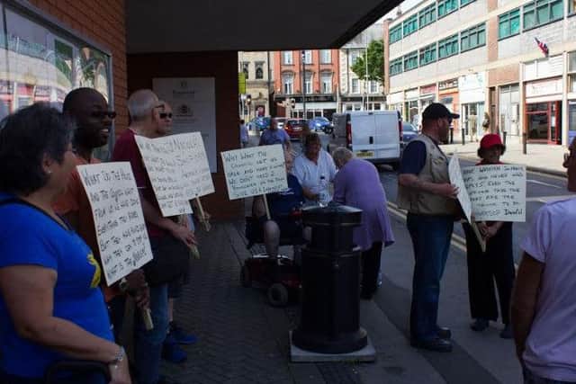 The protest on Queen Street. Photo by Bill Miller.