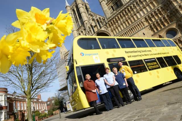 Stagecoach East Midlands Daffodil Bus launch. From left, MIchelle Hargreaves (MD of Stagecoach East Midlands), Marie Curie nurses Allsion Foster (correct) and Carol Carter, Sue Smith (Technial Nurse Manager for Marie Curie) and Gary Burr (Community Fund Raiser for Marie Curie)