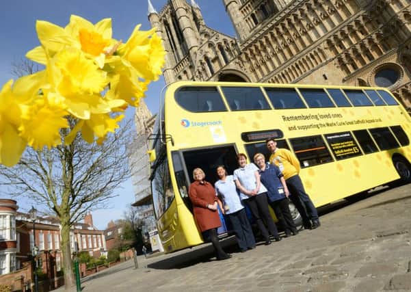 Stagecoach East Midlands Daffodil Bus launch. From left, MIchelle Hargreaves (MD of Stagecoach East Midlands), Marie Curie nurses Allsion Foster (correct) and Carol Carter, Sue Smith (Technial Nurse Manager for Marie Curie) and Gary Burr (Community Fund Raiser for Marie Curie)