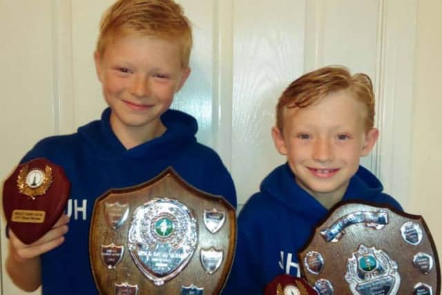 KINGS OF THE WOLDS -- brothers Joe and Jasper Humphries, of Gainsborough Striders, who picked up trophies in the Wolds Dash series of races.