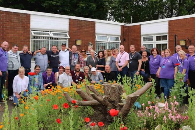 Service users, their families and Aspire staff at New Beginnings