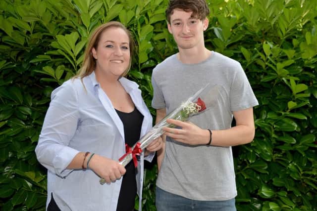 Guardian Rose presentation to Ethan Jeffrey nominated by Guardianâ¬"s Robyn Wilson, after Ethan found a missing wedding ring