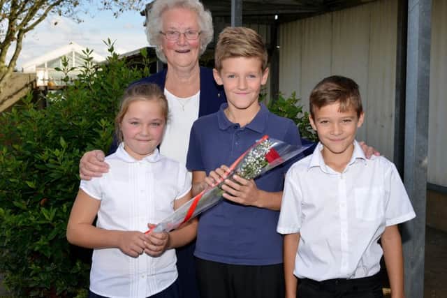 Guardian Rose presentation to Spencer Presho, 10 who helped a school friend when she had an accident. Spencer is pictured receiving his rose from Kacey Clarkson, 10 watched by his Nan Slyvia Middleton who nomiated Spencer and Kaceyâ¬"s twin brother Kallum Clarkson, 10