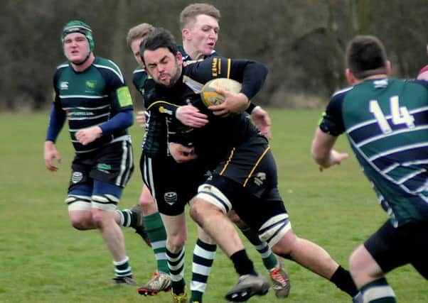 DO YOU FANCY PLAYING? -- Gainsborough All Blacks in action.
