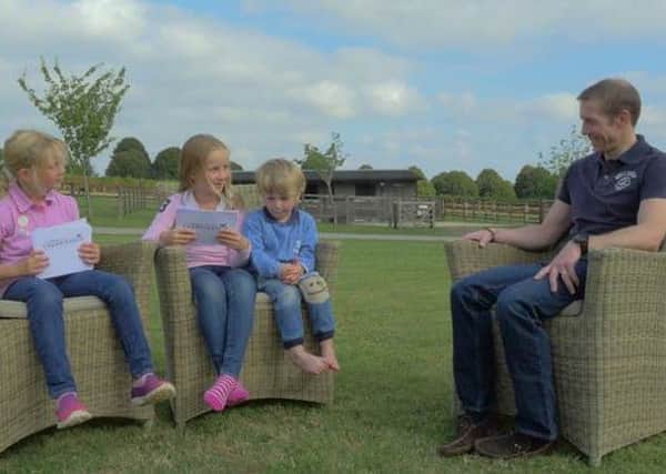 WHO'S THE DADDY? -- Jim Crowley, pictured relaxing with his three children, Bella, 7, Alice, 9, and Sam, 3, will be crowned champion jockey for the first time at Ascot on Saturday.