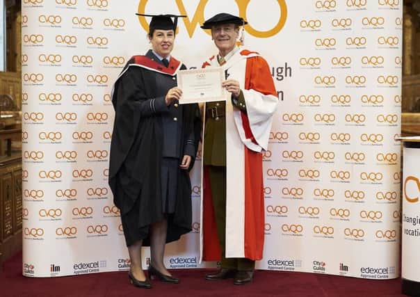 Flight Lieutenant Kathryn Hearn and CVQO chairman, The Lord Lingfield