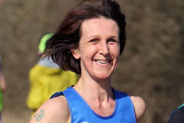 CARRY ON RUNNING! -- plucky Gainsborough Strider Karen Creed, who ran 6k of a 10k race in Nottinghamshire without realising she had dislocated her shoulder in a fall.