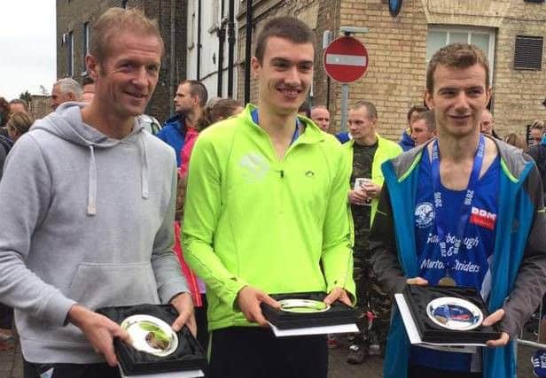 POPPY POWER -- the Striders trio who took second place in the Brigg Poppy 10k. From left, Ronnie McWilliam, Mat Huteson and James Croft. (PHOTO BY: Craig Ward)