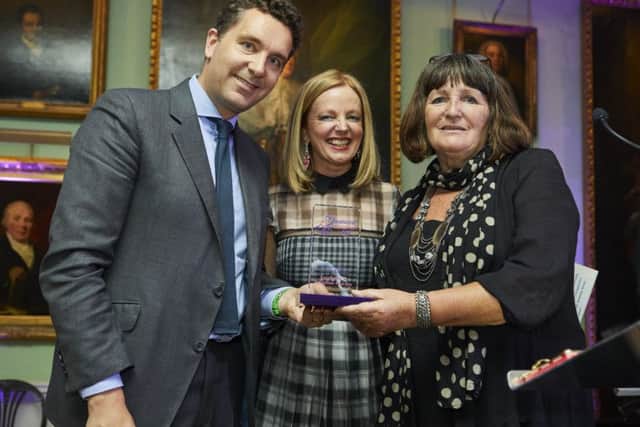 Edward Timpson MP and Clare Grogan presenting the award to Anne Johnson (right) team manager for the council's adoption team.