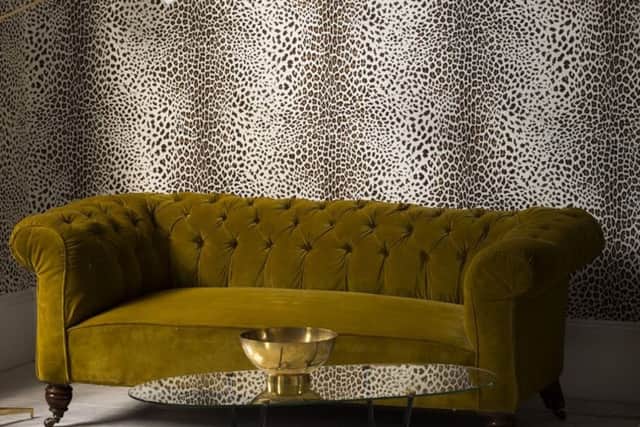 Leopard print, beige, wallpaper, £20 a roll, available from Graham and Brown. Picture credit: PA Photo/Handout.