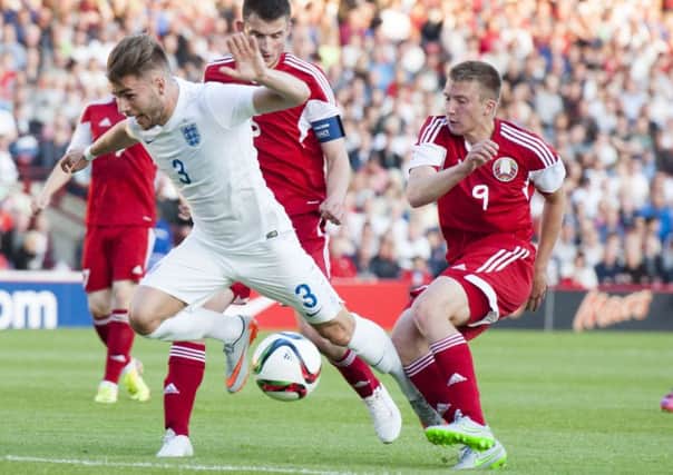 England U21 v Belarus U21Englands Luke Garbutt is hackred down by Yahuhen Leshka