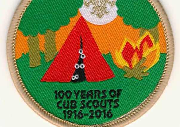 Cubs across the UK have been given a special badge to help mark the movement's centenary